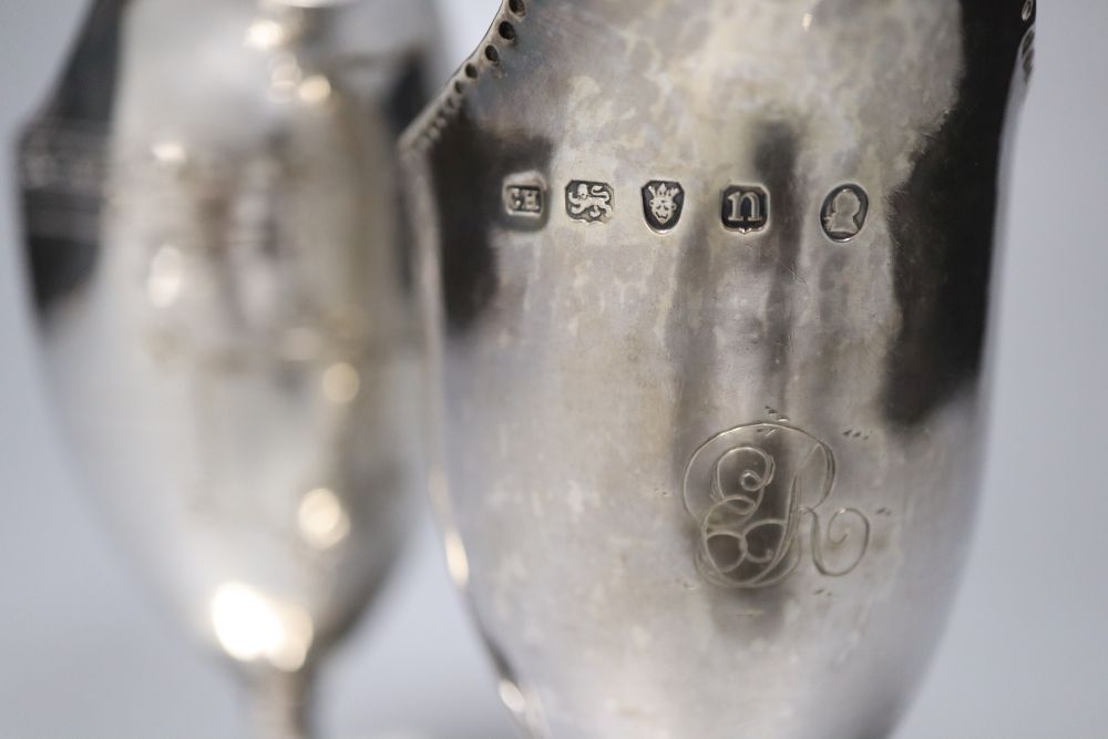 Four silver helmet-shaped cream jugs, approx 11oz